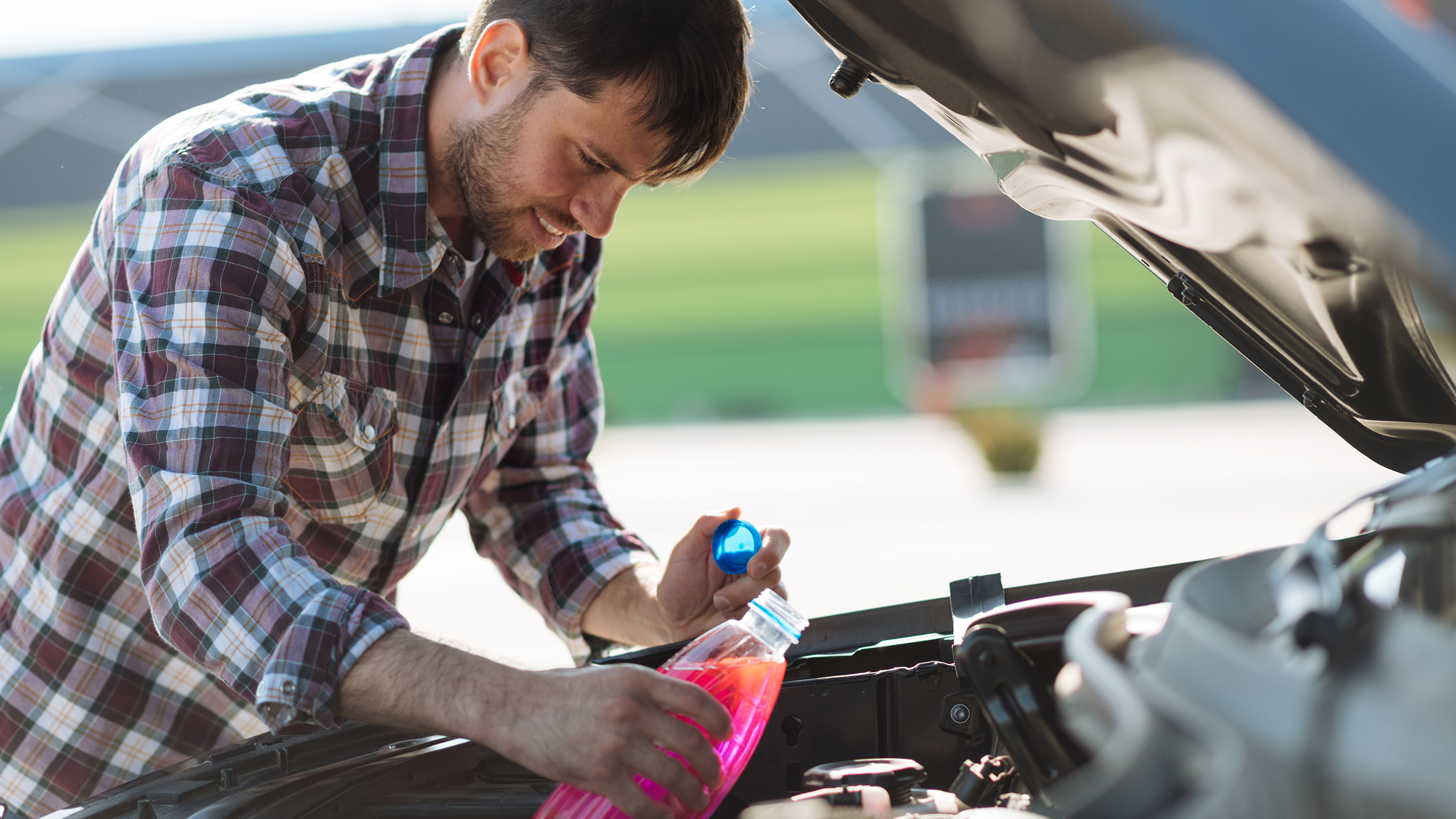 Windshield washer fluid car cap hi-res stock photography and