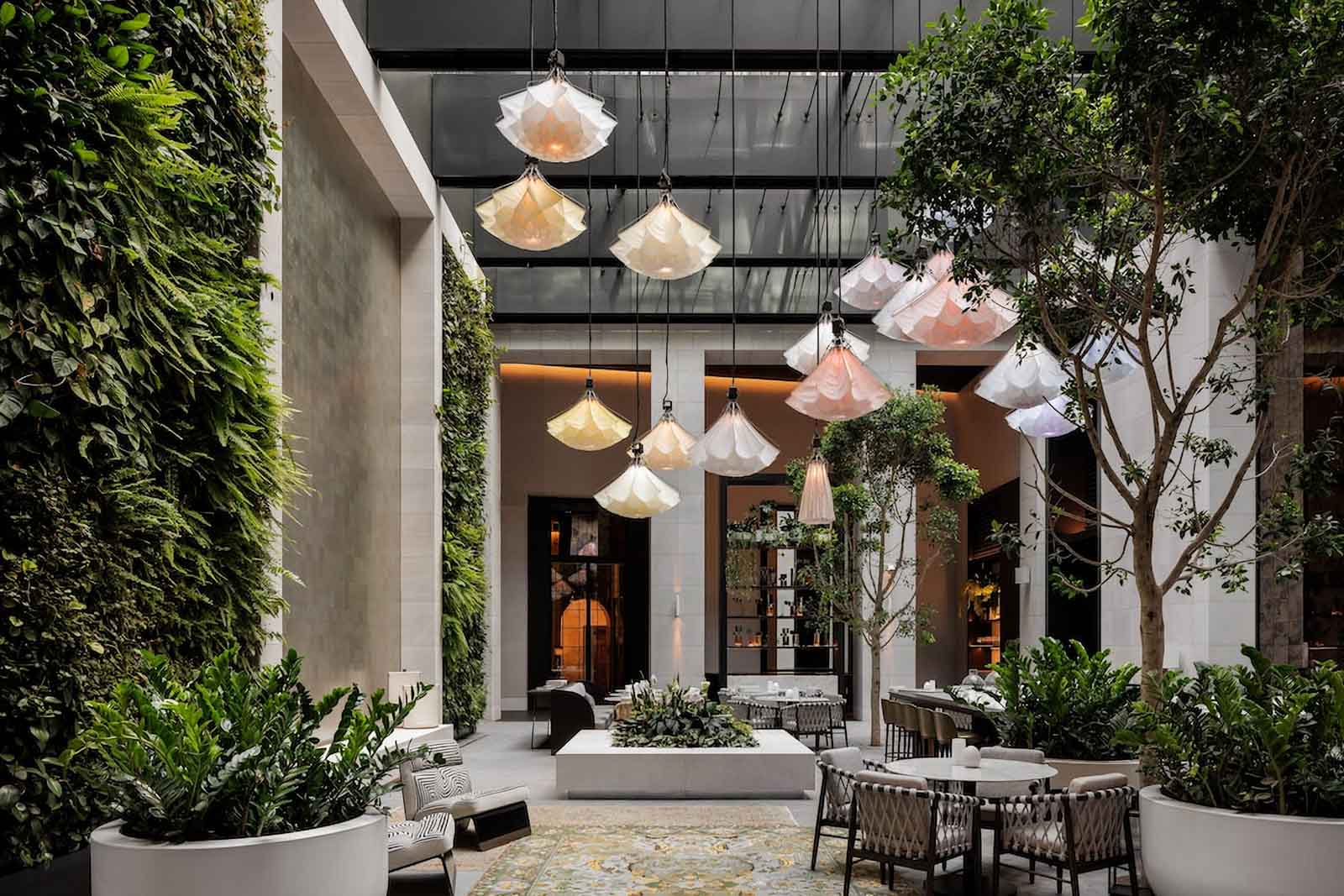 Atrium with lounge seating and greenery