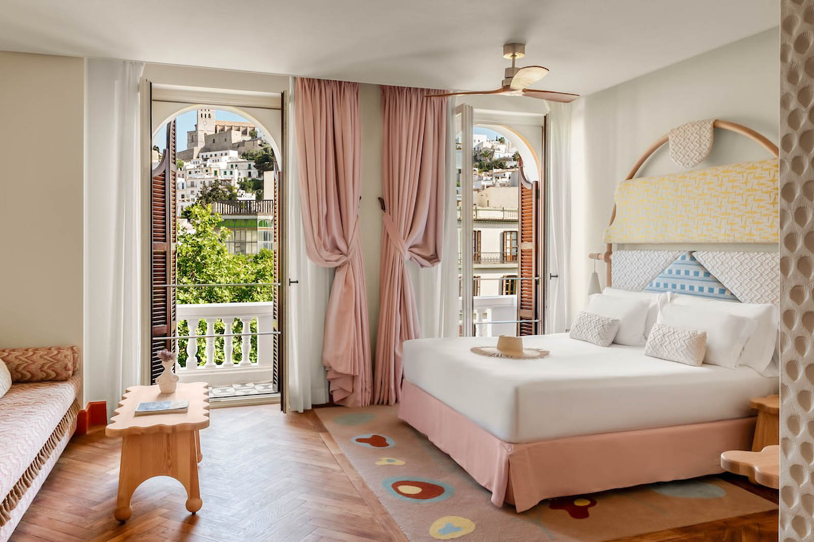 Bedroom with large windows and balcony